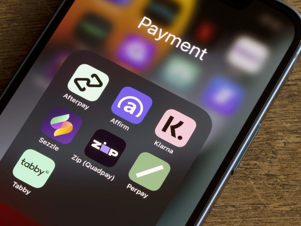 Assorted payment apps offering Buy Now Pay Later services are seen on an iPhone, including Afterpay, Affirm, Klarna, Sezzle, Zip (Quadpay), Perpay, and Tabby.