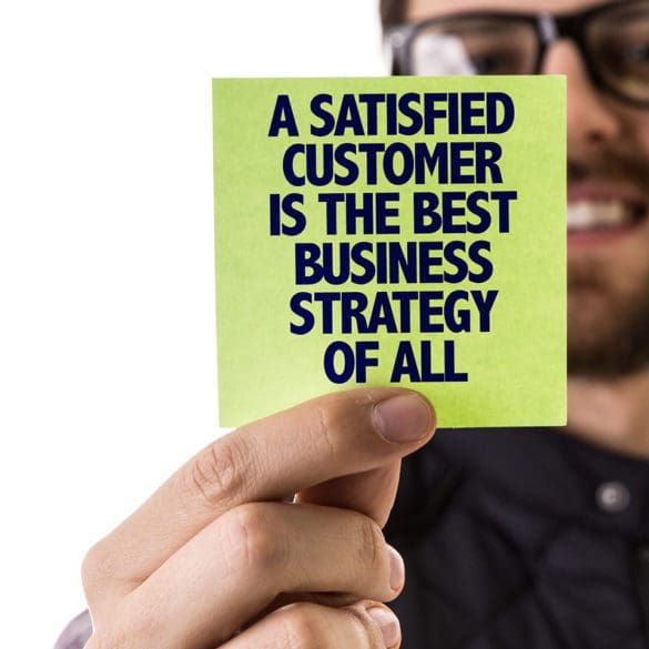 A Satisfied Customer Is The Best Business Strategy of All sign