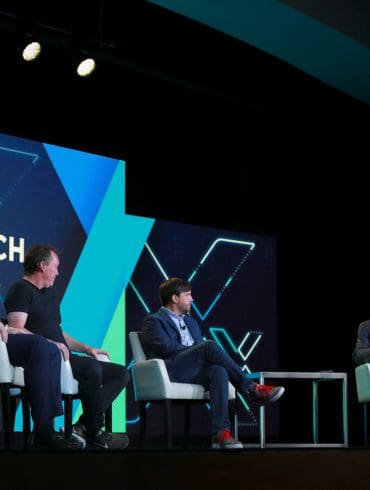 During a fireside chat, Co-founder and CEO of Figure Mike Cagney(center Left) Wade Peery, CAO of FirstBank, (Left) and Matthew Maxey, Head of innovation at Synovus bank (Center Right), sat down with Peter Renton to discuss the future of stablecoin payments on the Fintech Nexus Keynote stage on May 26th, 2022 in New York City.