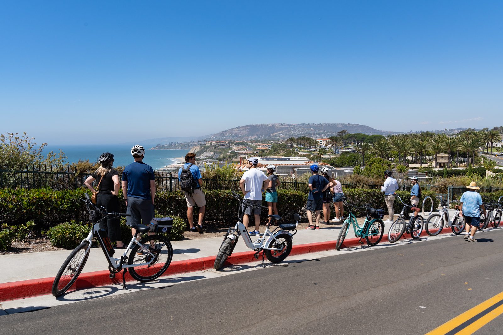 Attendees take a break from an e-bike excursion.