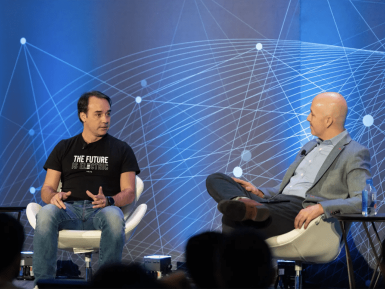 Sergio Furio, Founder and CEO of the Brazilian Loan fintech Creditas (Left) and Andres Fontao, co-founder of Finnovista on the keynote stage at the LendIt Fintech LatAm conference in Miami, Fla, on Tuesday, Dec. 7, 2021