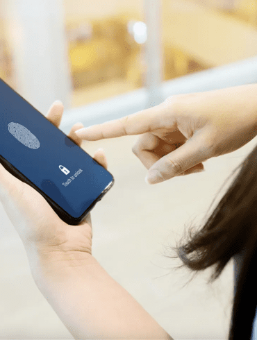 Woman using biometrics on smartphone