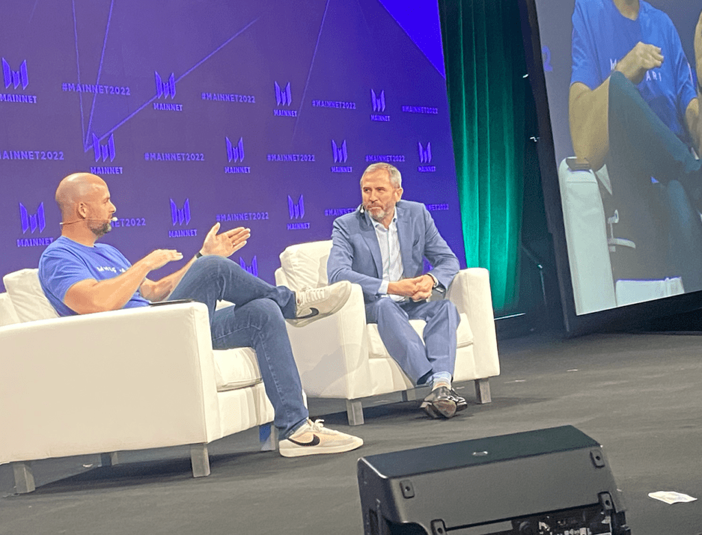 Ryan Selkis from Messari (left) and Brad Garlinghousr, CEO of Ripple on the Mainnet stage on September 21, 2022 in New York City