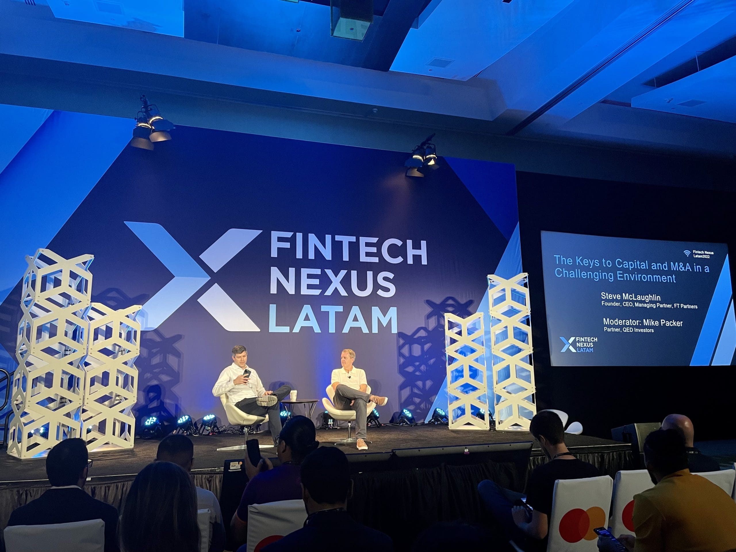 Mike Packer, QED Investors (left), chats with Steve McLaughlin FT Partners talked raising capital on the Latam keynote stage in Miami, Florida, on December 13, 2022