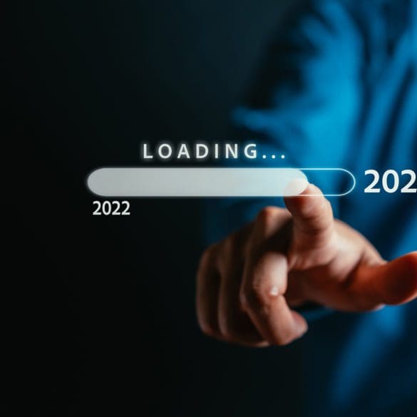 Businessman touching to virtual download bar and loading for New Year and changing year 2022 to 2023. start up planing business in next years concept.