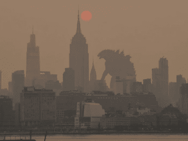 Photoshop of Godzilla walking through NYC in the smoke
